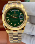 Rolex Datejust – 40mm, green dial, fluted bezel, jubilee bracelet, yellow gold – ref 228238 – image 1