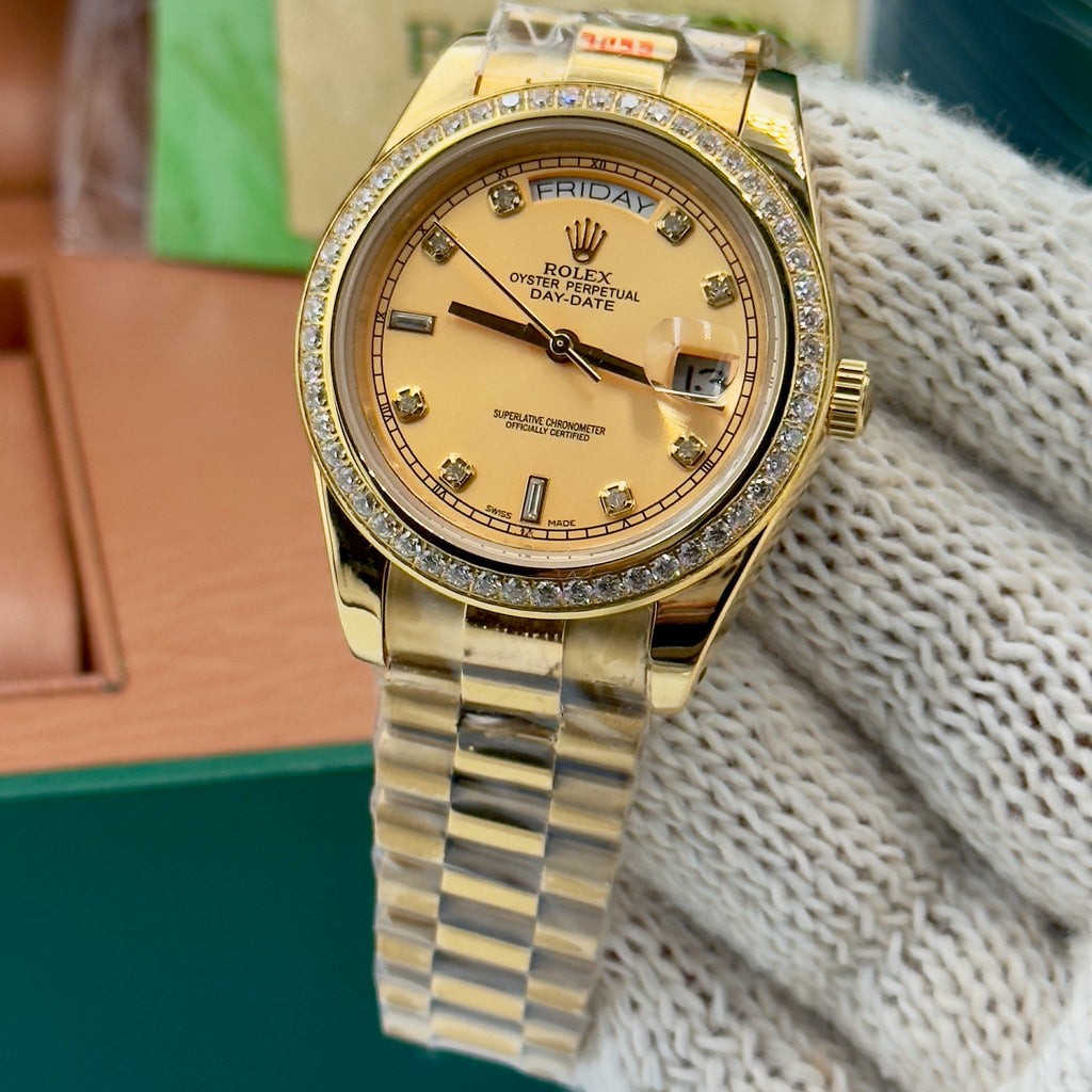 Rolex Datejust – 36mm, black dial, diamond bezel, jubilee bracelet, yellow gold – ref 118348 – image 1
