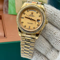 Rolex Datejust – 36mm, black dial, diamond bezel, jubilee bracelet, yellow gold – ref 118348 – image 1