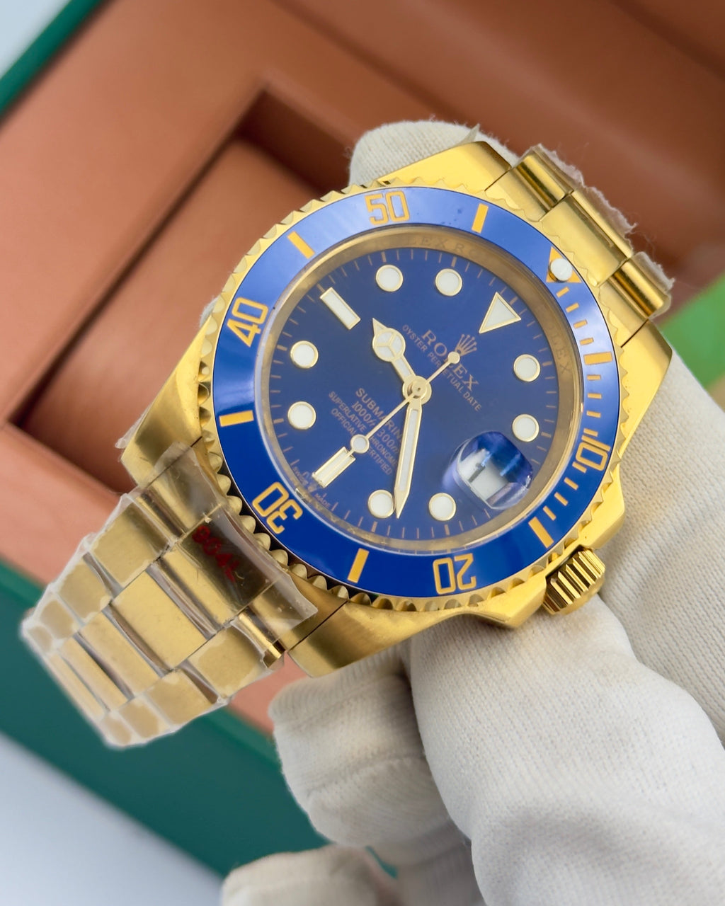 Rolex Submariner – 41mm, blue dial, cerachrom bezel, oyster bracelet, yellow gold – ref 126618LB – image 1